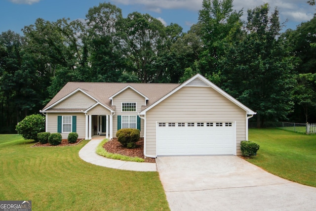 555 Flintlock Dr, Dacula, GA 30019 - view of front of home featuring concrete driveway, an attached garage, and view of wooded area