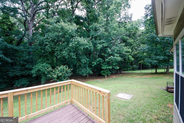 555 Flintlock Dr, Dacula, GA 30019 - view of yard with a wooden deck