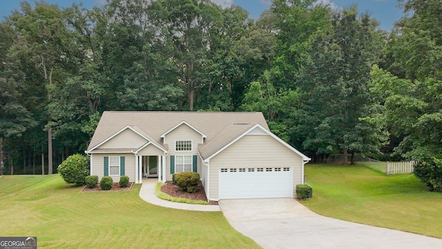 555 Flintlock Dr, Dacula, GA 30019 - view of front of home with concrete driveway and an attached garage