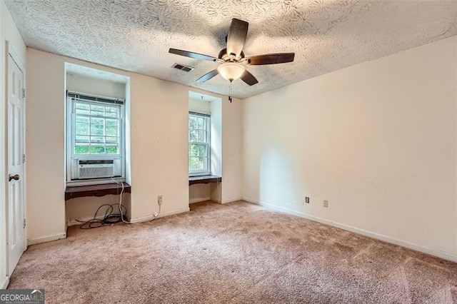 2867 Holly Oaks Dr, Marietta, GA 30062 - unfurnished bedroom with carpet, a textured ceiling, a ceiling fan, and cooling unit