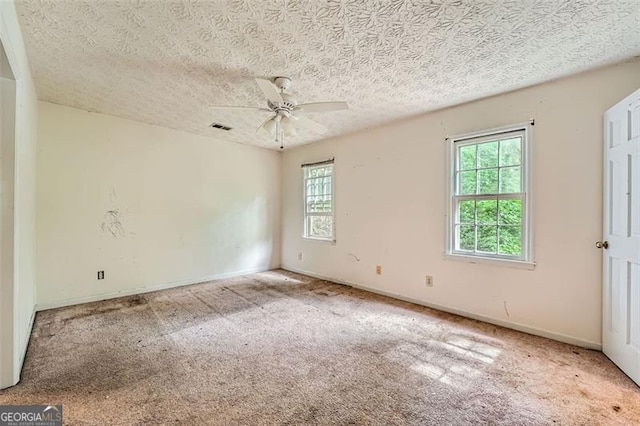 2867 Holly Oaks Dr, Marietta, GA 30062 - carpeted spare room with a ceiling fan and a textured ceiling