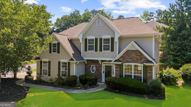 3559 Reservoir Pass, Acworth, GA 30101 - view of front of property featuring stone siding and a front yard