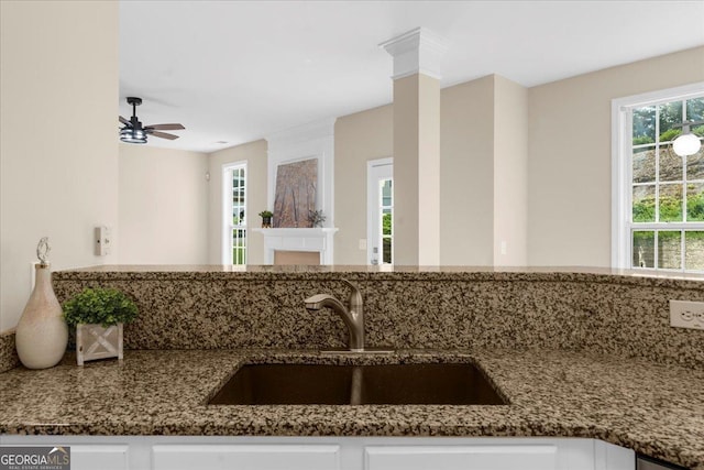 3559 Reservoir Pass, Acworth, GA 30101 - kitchen featuring dark stone counters, white cabinets, and a ceiling fan