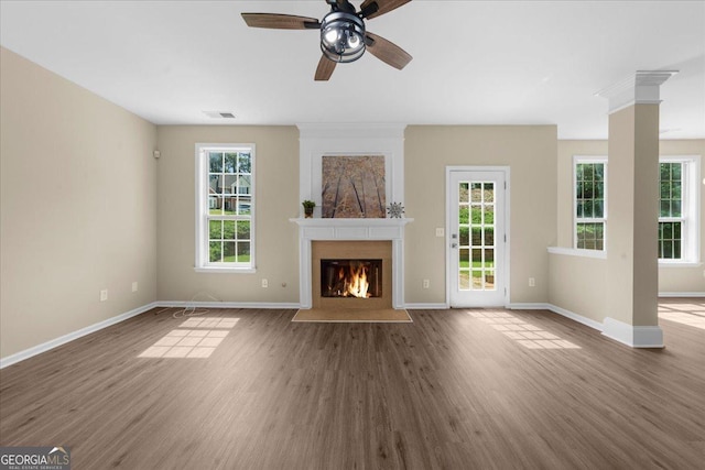 3559 Reservoir Pass, Acworth, GA 30101 - unfurnished living room featuring wood finished floors, a fireplace with flush hearth, and a ceiling fan