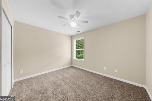 3559 Reservoir Pass, Acworth, GA 30101 - unfurnished bedroom featuring carpet flooring, a closet, and a ceiling fan