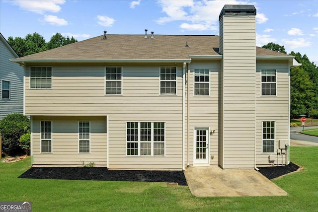 3559 Reservoir Pass, Acworth, GA 30101 - back of house featuring a patio, a lawn, and a chimney