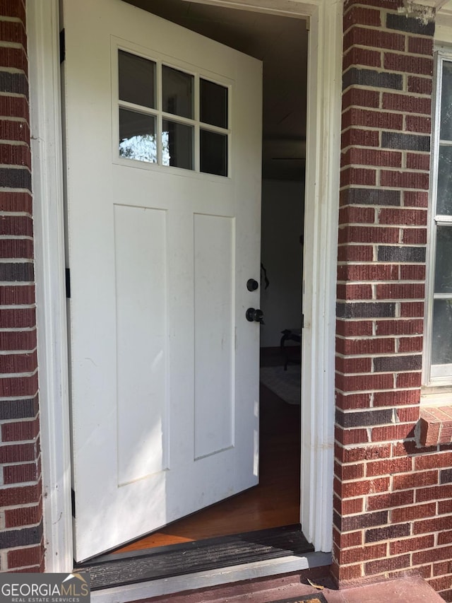 4510 Browns Bridge Rd, Gainesville, GA 30504 - view of exterior entry featuring brick siding