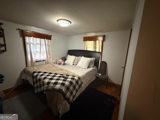 4510 Browns Bridge Rd, Gainesville, GA 30504 - bedroom with wood finished floors and multiple windows