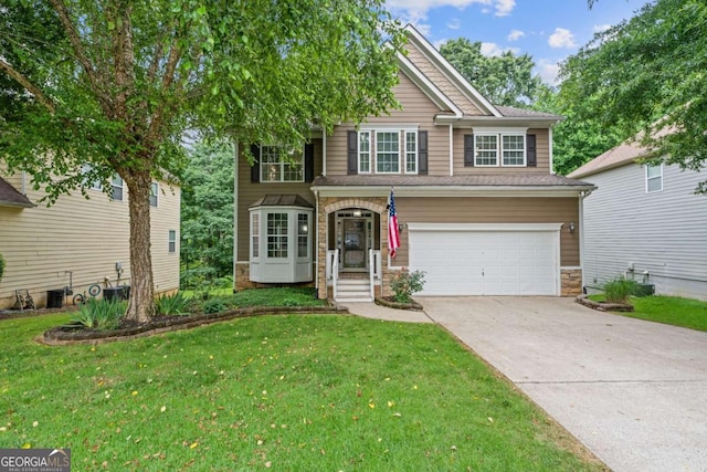 950 Mill Creek Ave, Canton, GA 30115 - traditional-style house featuring stone siding, concrete driveway, an attached garage, and a front lawn