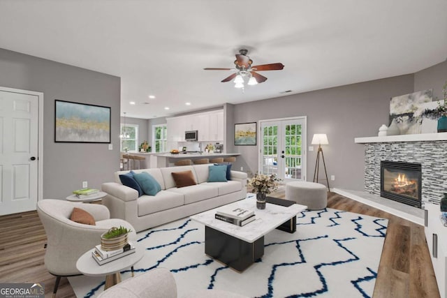 950 Mill Creek Ave, Canton, GA 30115 - living area featuring ceiling fan, plenty of natural light, a fireplace, wood finished floors, and recessed lighting
