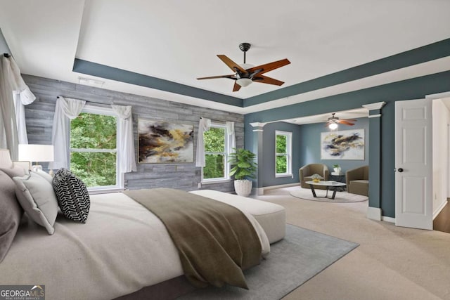 950 Mill Creek Ave, Canton, GA 30115 - carpeted bedroom featuring a tray ceiling and ceiling fan