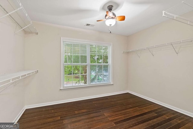 950 Mill Creek Ave, Canton, GA 30115 - walk in closet featuring wood finished floors and ceiling fan