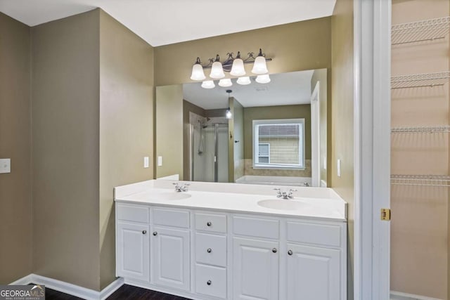 950 Mill Creek Ave, Canton, GA 30115 - bathroom with a stall shower, a spacious closet, double vanity, and a bathtub