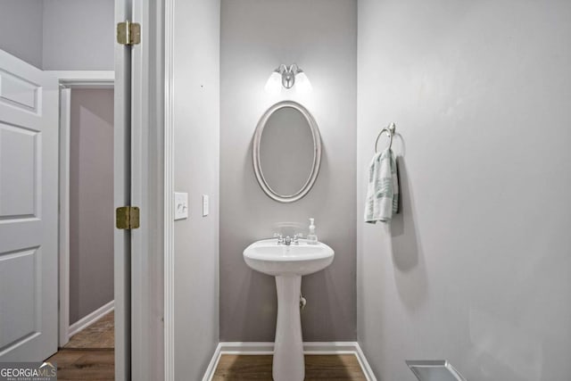 950 Mill Creek Ave, Canton, GA 30115 - bathroom with baseboards and wood finished floors