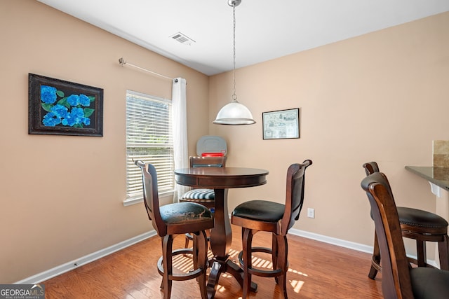 305 Hidden Creek Ln, Canton, GA 30114 - dining area with light wood-style floors