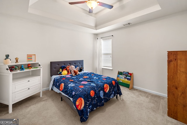 305 Hidden Creek Ln, Canton, GA 30114 - carpeted bedroom with a raised ceiling and a ceiling fan