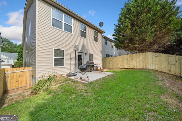 305 Hidden Creek Ln, Canton, GA 30114 - rear view of property featuring a patio and a fenced backyard