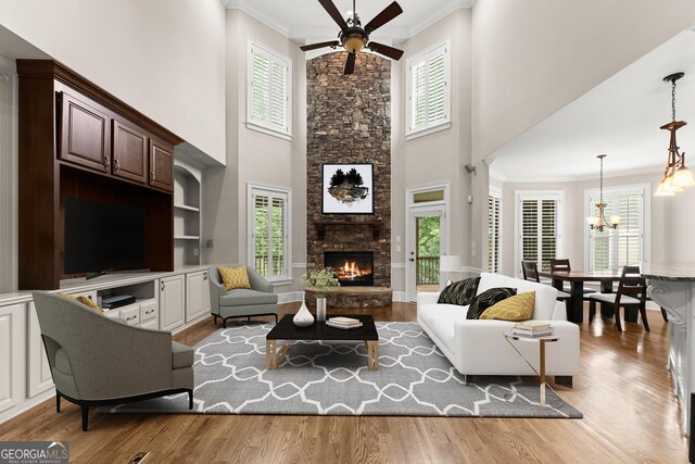 3311 Marina View Way, Gainesville, GA 30506 - living room featuring ceiling fan, a high ceiling, plenty of natural light, and ornamental molding