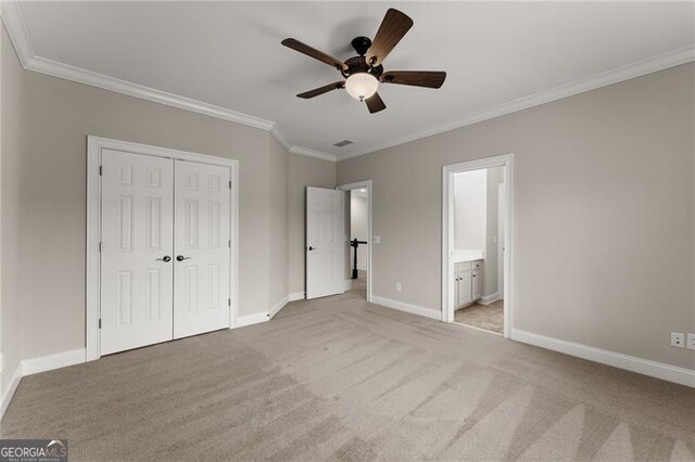 3311 Marina View Way, Gainesville, GA 30506 - unfurnished bedroom with ornamental molding, light carpet, a closet, ceiling fan, and ensuite bathroom