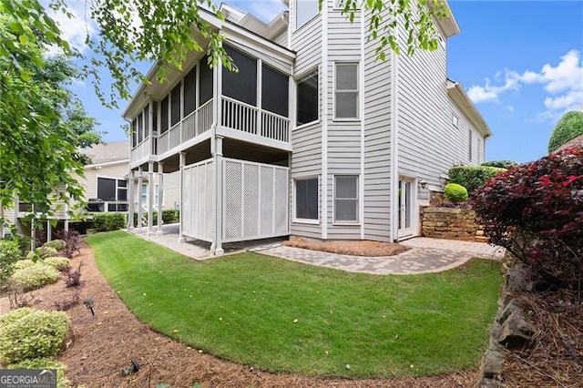 3311 Marina View Way, Gainesville, GA 30506 - rear view of property featuring a yard and a sunroom
