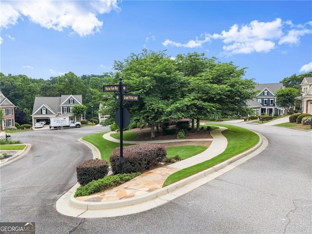 3311 Marina View Way, Gainesville, GA 30506 - view of asphalt road with curbs, a residential view, and sidewalks