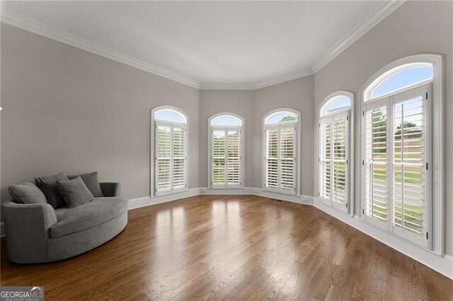 3311 Marina View Way, Gainesville, GA 30506 - sitting room with wood finished floors, healthy amount of natural light, and crown molding