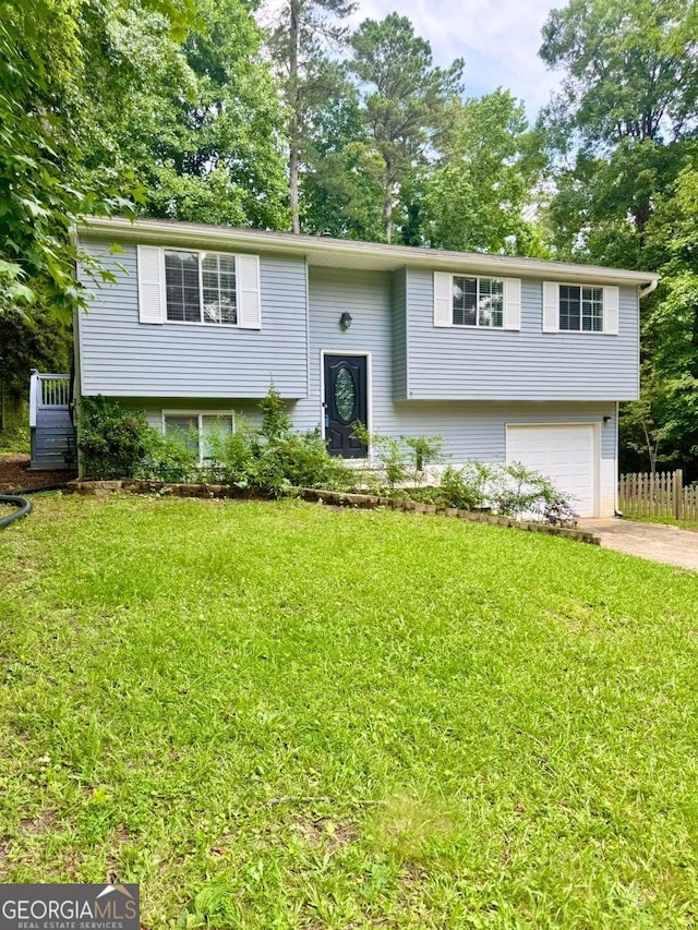 3544 Citrus Dr, Duluth, GA 30096 - split foyer home featuring concrete driveway and a garage