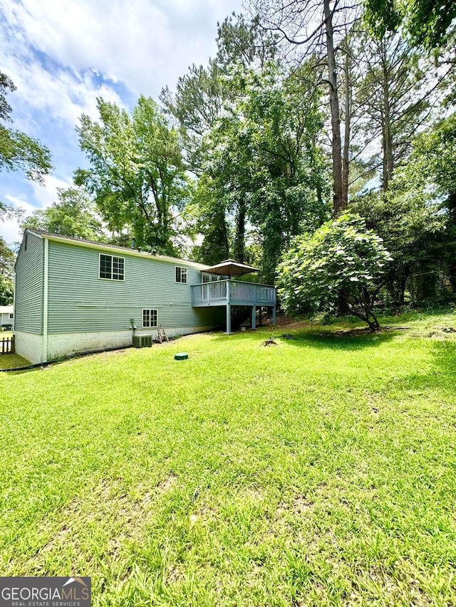 3544 Citrus Dr, Duluth, GA 30096 - rear view of house with a wooden deck and a lawn
