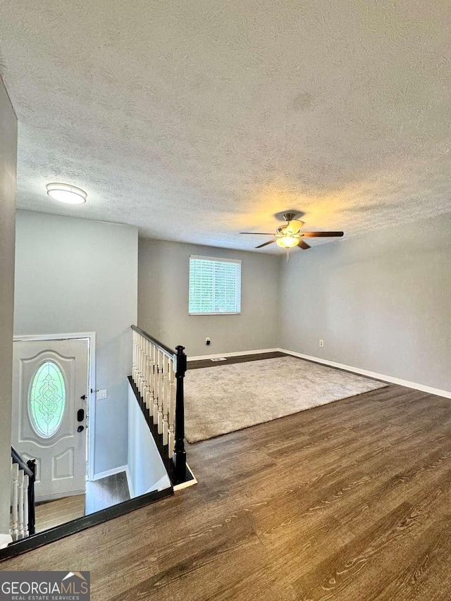 3544 Citrus Dr, Duluth, GA 30096 - entryway featuring a textured ceiling, wood finished floors, and a ceiling fan