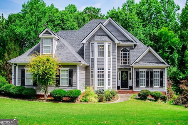 204 Pinehurst Way, Carrollton, GA 30116 - view of front of home featuring a front yard and roof with shingles