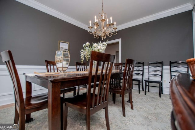 204 Pinehurst Way, Carrollton, GA 30116 - dining area with a chandelier, crown molding, and a wainscoted wall