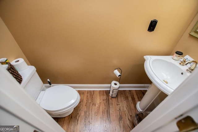 204 Pinehurst Way, Carrollton, GA 30116 - bathroom featuring wood finished floors and a sink