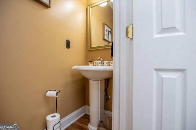 204 Pinehurst Way, Carrollton, GA 30116 - bathroom featuring wood finished floors and baseboards