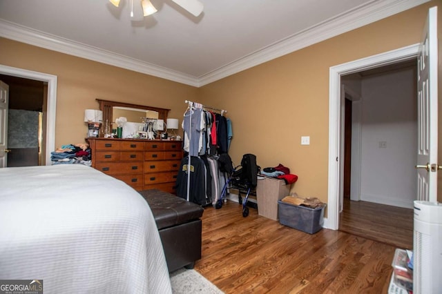 204 Pinehurst Way, Carrollton, GA 30116 - bedroom with crown molding, wood finished floors, and a ceiling fan