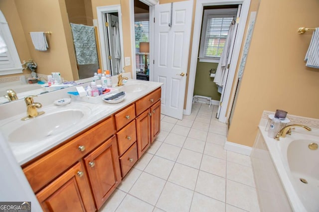 204 Pinehurst Way, Carrollton, GA 30116 - bathroom featuring a bath, double vanity, tile patterned flooring, and plenty of natural light