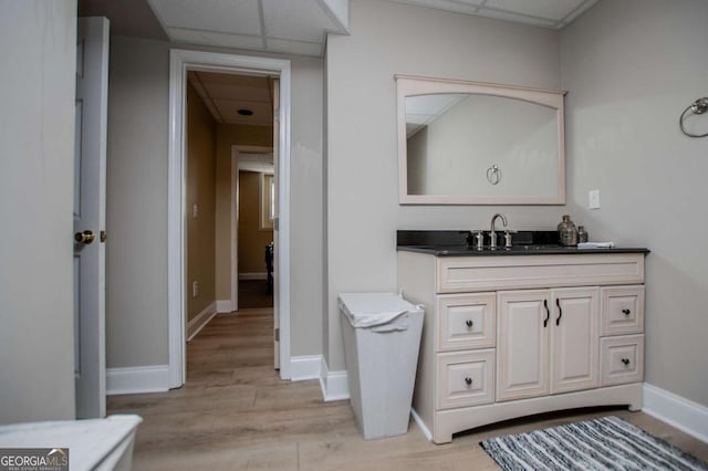 204 Pinehurst Way, Carrollton, GA 30116 - bathroom with a drop ceiling, wood finished floors, and vanity