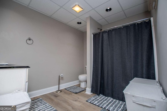 204 Pinehurst Way, Carrollton, GA 30116 - bathroom with wood finished floors, a shower with shower curtain, and a drop ceiling