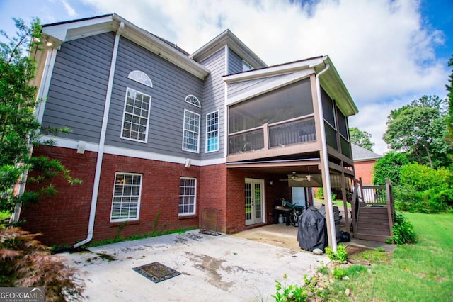 204 Pinehurst Way, Carrollton, GA 30116 - back of house featuring a patio, brick siding, stairway, and a sunroom