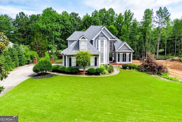 204 Pinehurst Way, Carrollton, GA 30116 - view of front facade featuring a front yard and driveway