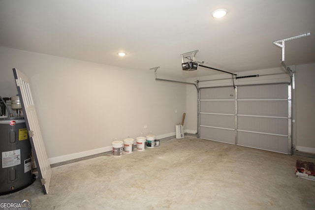 266 Patillo Rd, Jackson, GA 30233 - garage featuring water heater, a garage door opener, and recessed lighting