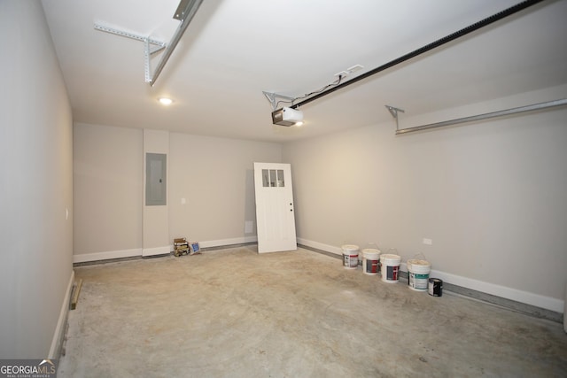 266 Patillo Rd, Jackson, GA 30233 - garage featuring a garage door opener and electric panel
