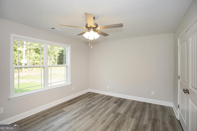 266 Patillo Rd, Jackson, GA 30233 - empty room with a ceiling fan and wood finished floors