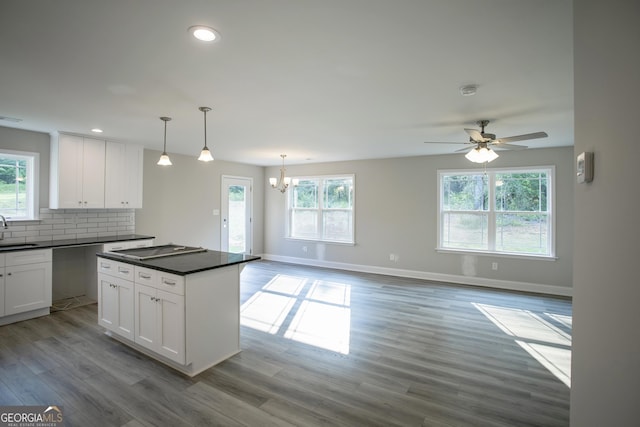 266 Patillo Rd, Jackson, GA 30233 - kitchen featuring dark countertops, healthy amount of natural light, white cabinetry, and recessed lighting