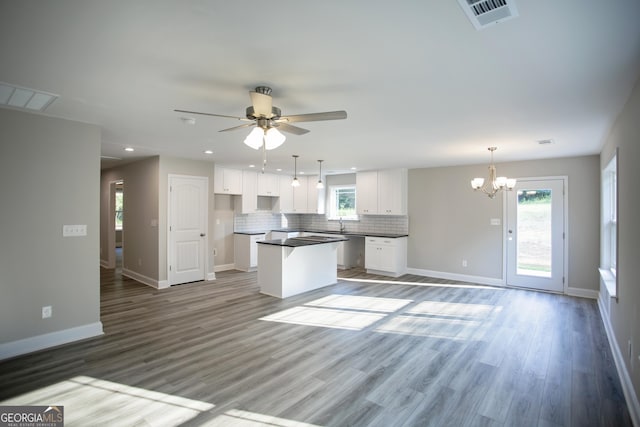 266 Patillo Rd, Jackson, GA 30233 - kitchen featuring a kitchen island, recessed lighting, a chandelier, backsplash, and white cabinets