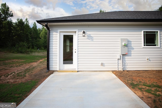 266 Patillo Rd, Jackson, GA 30233 - back of house with a shingled roof and a patio