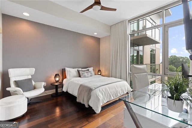 905 Juniper St NE Unit 701, Atlanta, GA 30309 - bedroom with multiple windows, hardwood / wood-style flooring, a wall of windows, ceiling fan, and recessed lighting