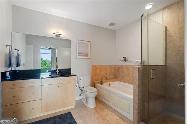 905 Juniper St NE Unit 701, Atlanta, GA 30309 - full bathroom with vanity, a bath, a stall shower, and tile patterned flooring
