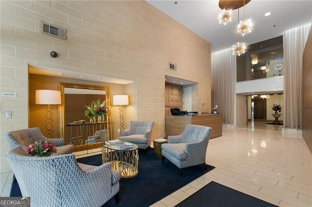 905 Juniper St NE Unit 701, Atlanta, GA 30309 - lobby featuring a high ceiling and recessed lighting