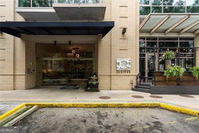 905 Juniper St NE Unit 701, Atlanta, GA 30309 - entrance to property featuring uncovered parking