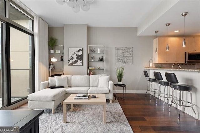 905 Juniper St NE Unit 701, Atlanta, GA 30309 - living area with wood finished floors and recessed lighting